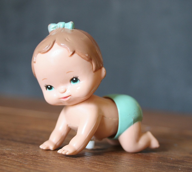 screwed toy crawling baby in pampers